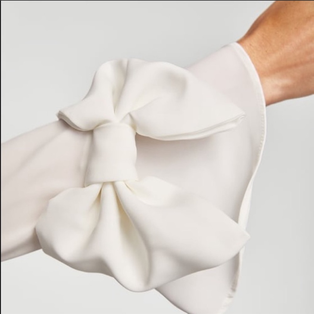 Zara Long Sleeve White V-Neck with Bow on Cuffs.